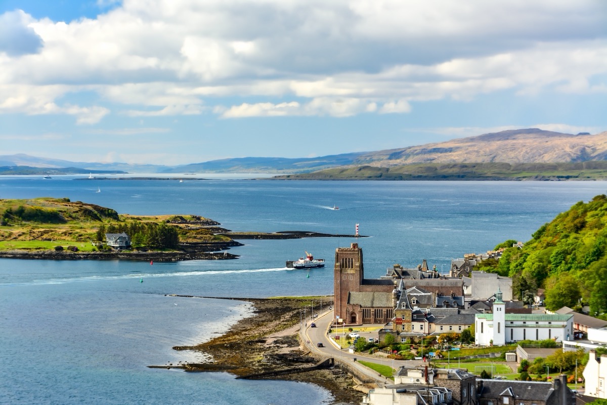 View over Oban harbour with a ferry leaving for the Inner Hebrides